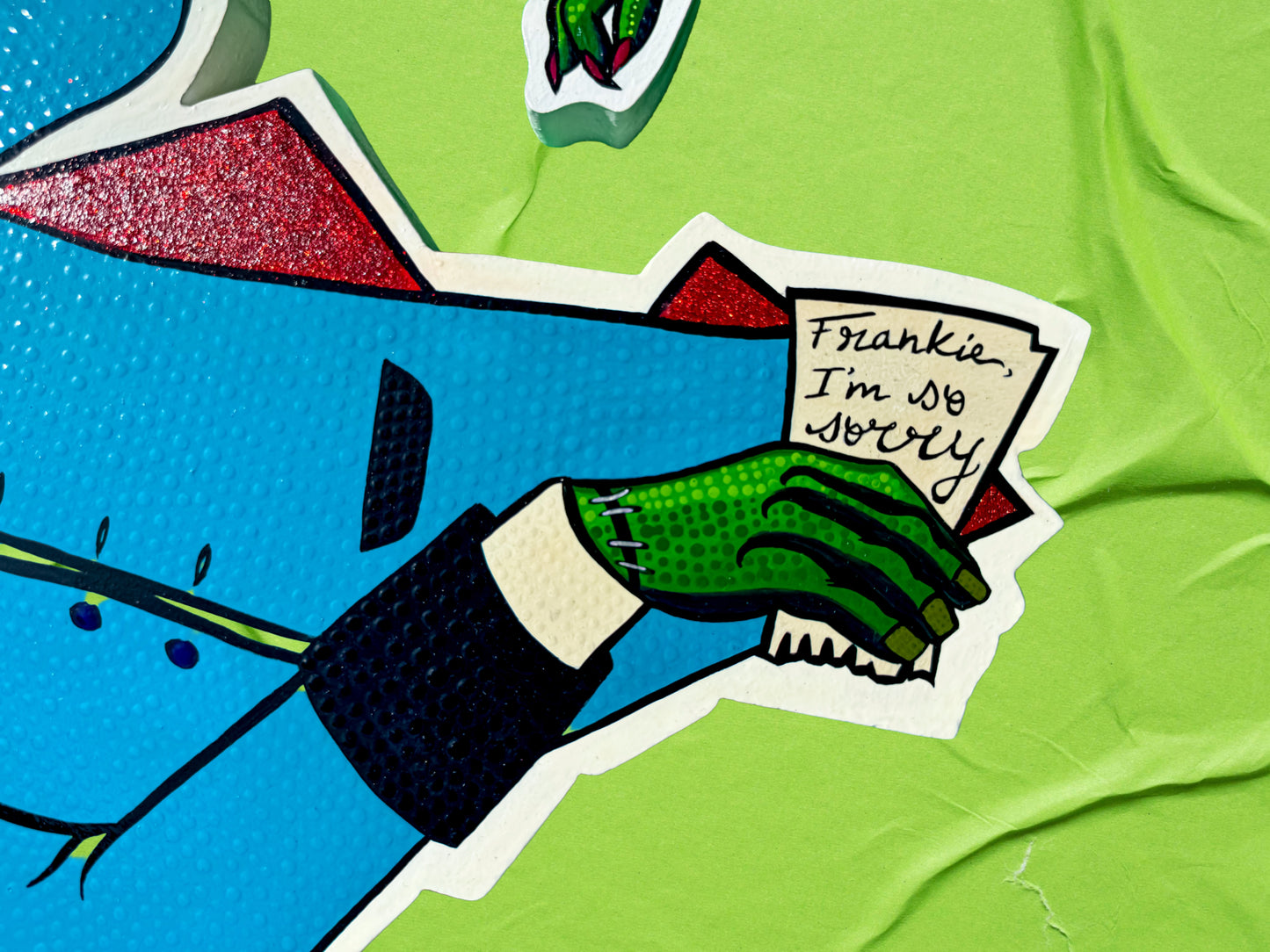 Close up detail of Frankie hand-painted artwork from Frankie and Bridie in the Monsters Collection by Stoofy