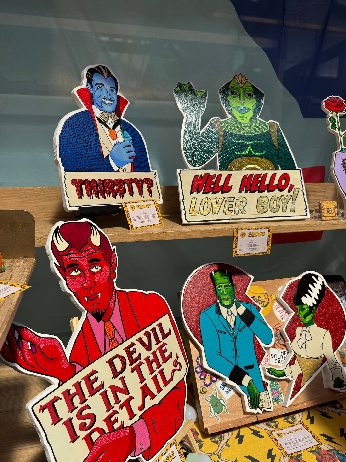 Monsters Collection - hand-painted artworks on display