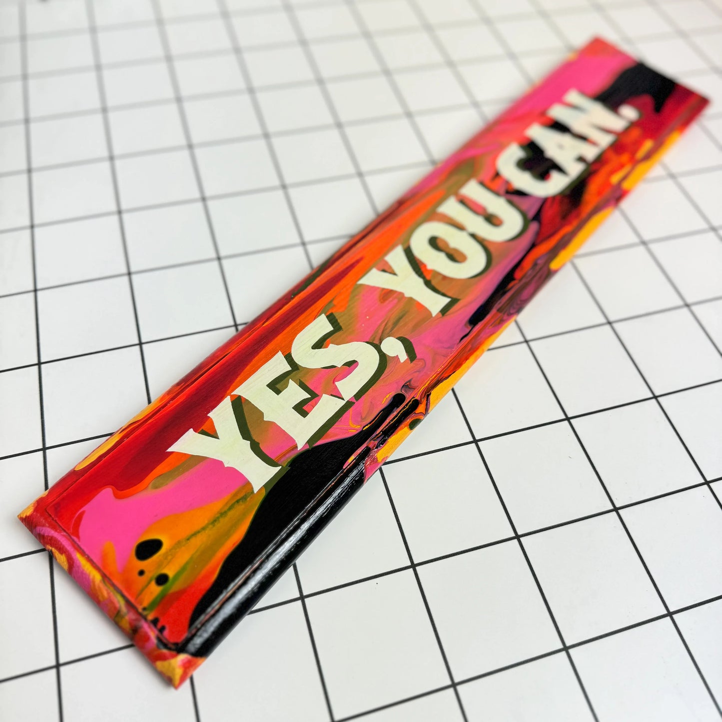 Hand-painted 'Yes, you can' sign artwork in bold pinks, reds, oranges and navy with an eye catching cream and green font, finished in high gloss varnish, by Stoofy. Sign-writing, contemporary, maximalist art and unique interior décor with personality. Human-made.