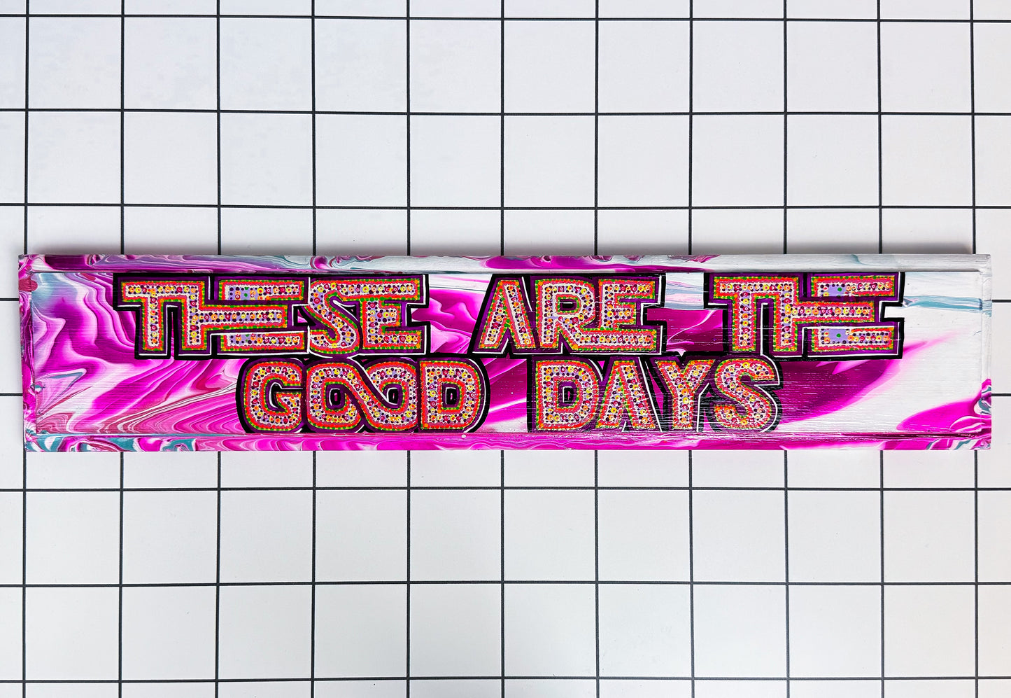 āThese Are the Good Daysā sign in soft pastel colours with detailed paint dots and glossy finish, hand-painted on wood by Stoofy.