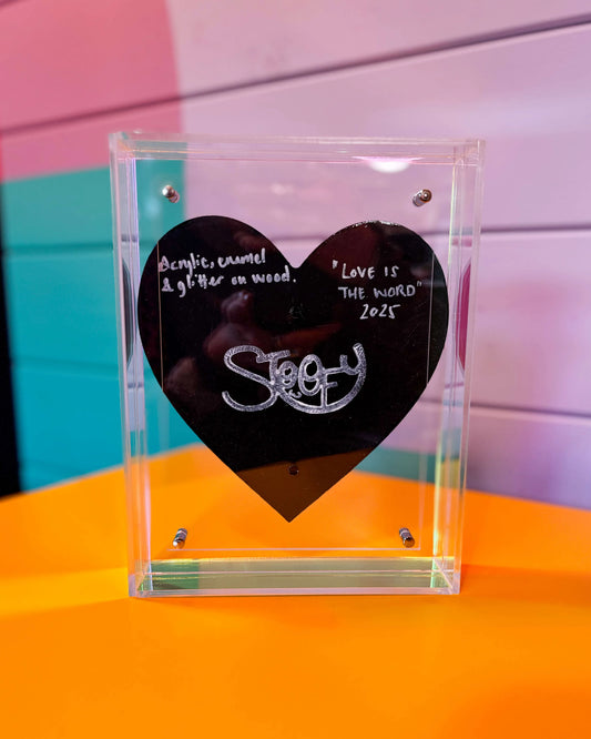 Transparent back of Love Is All You Need framed artwork