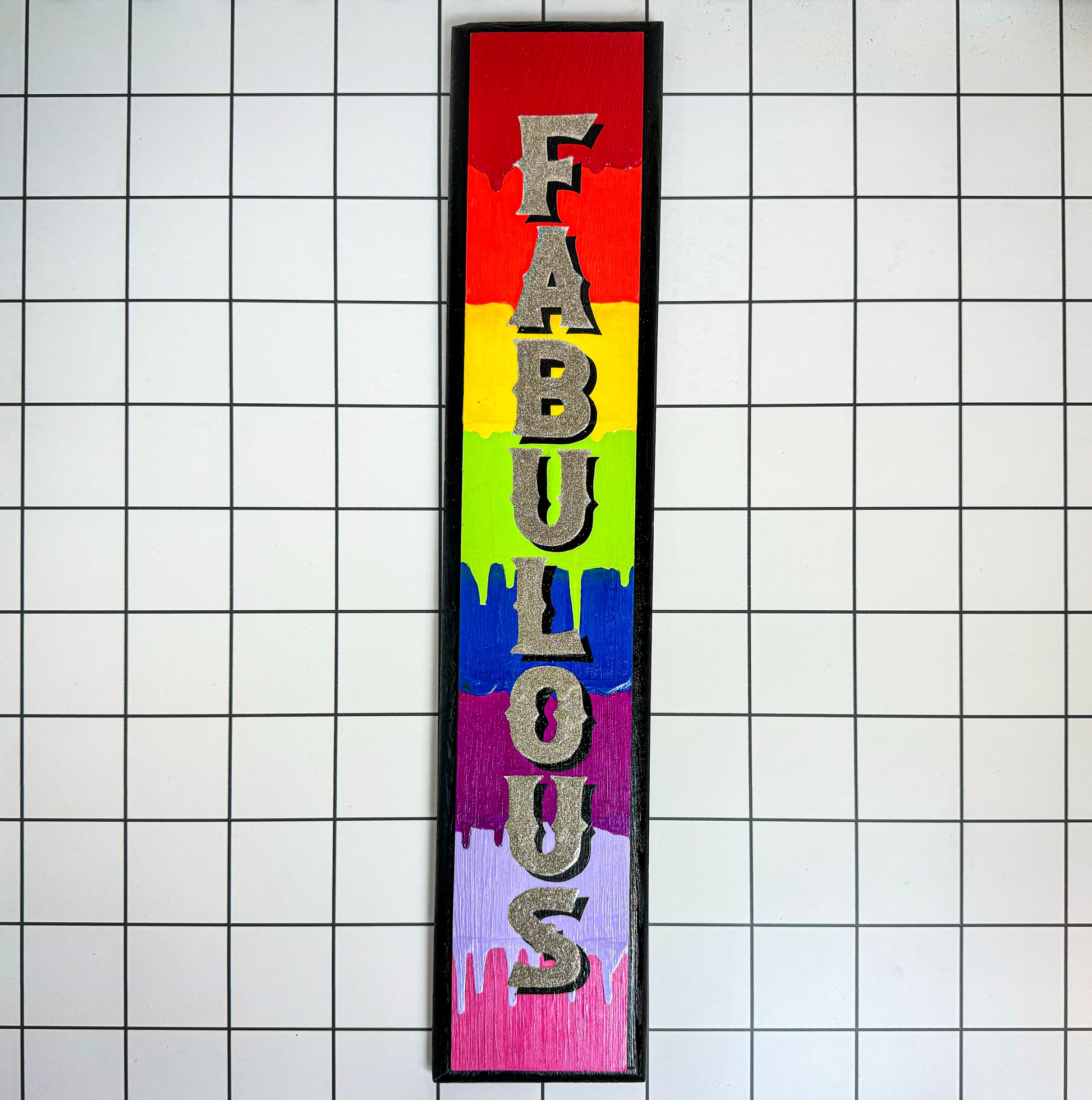 Main image of Stoofy's vertical ‘Fabulous’ hand-painted sign with rainbow dripping acrylic colours and glittery typography on a wooden plaque, finished in gloss varnish. Limited edition, original, contemporary art for maximalist interiors by UK artist, Stoofy.