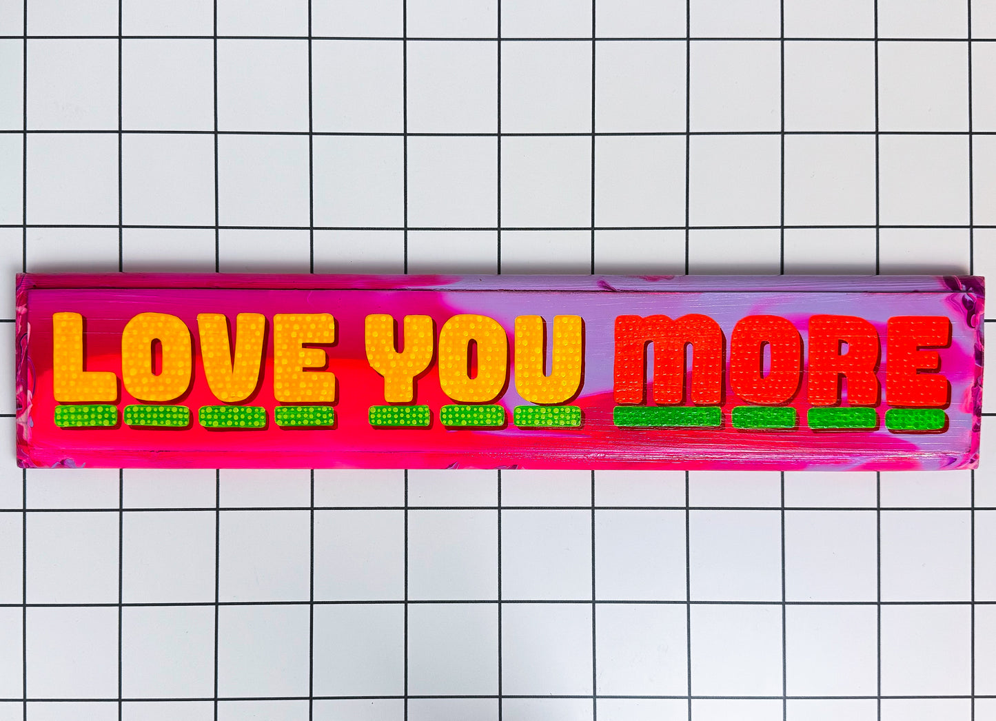 Main view of Stoofy's unique hand-painted "Love You More" sign – colourful, romantic wooden wall art with a bold, humorous twist. Ideal gift for couples or maximalist interiors.