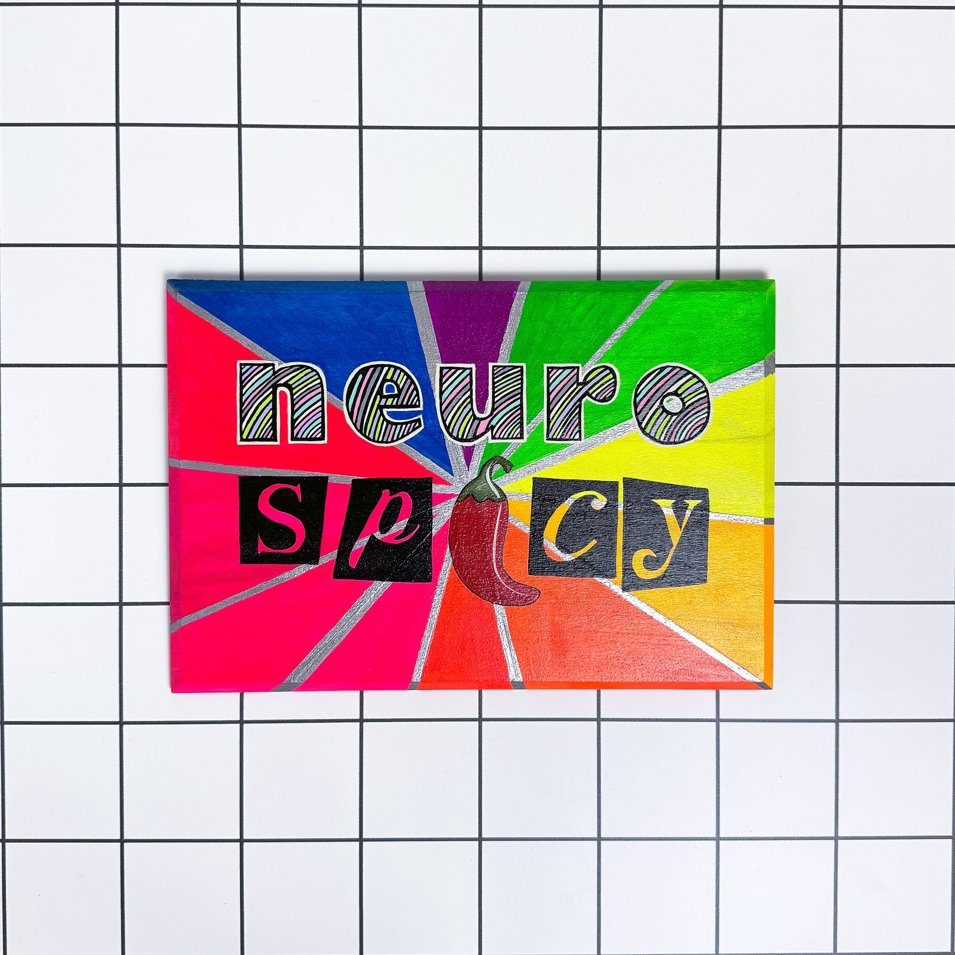 Main image of Stoofy's original artwork - Neuro Spicy sign with pastel lettering and silver accents on a rainbow spectrum background, hand-painted with a glossy finish. Limited edition, maximalist, contemporary art by UK artist, Stoofy.