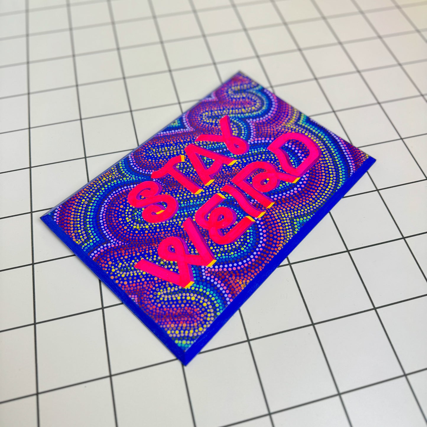 Alternative view of Stoofy's colourful hand-painted sign-writing art with “Stay Weird” in funky, bold ltypography and intricate dot work by artist, Stoofy. Limited edition, contemporary, maximalist art for modern collectors.