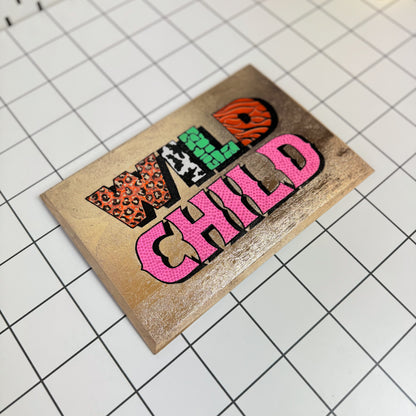 Alternative view of Stoofy's original Wild Child signwriting artwork with gold leaf and bold acrylic lettering on a white background hand-painted and gloss finished . This is a limited edition, one of one maximalist, contemporary artwork by UK artist, Stoofy. 