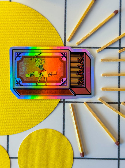 Stoofy's 'Light My Fire"die cut vinyl sticker holographic pin up vintage sailor Jerry tattoo inspired light my fire swallows matchbox matchsticks sticker head. Design and copyright owned by Stoofy.