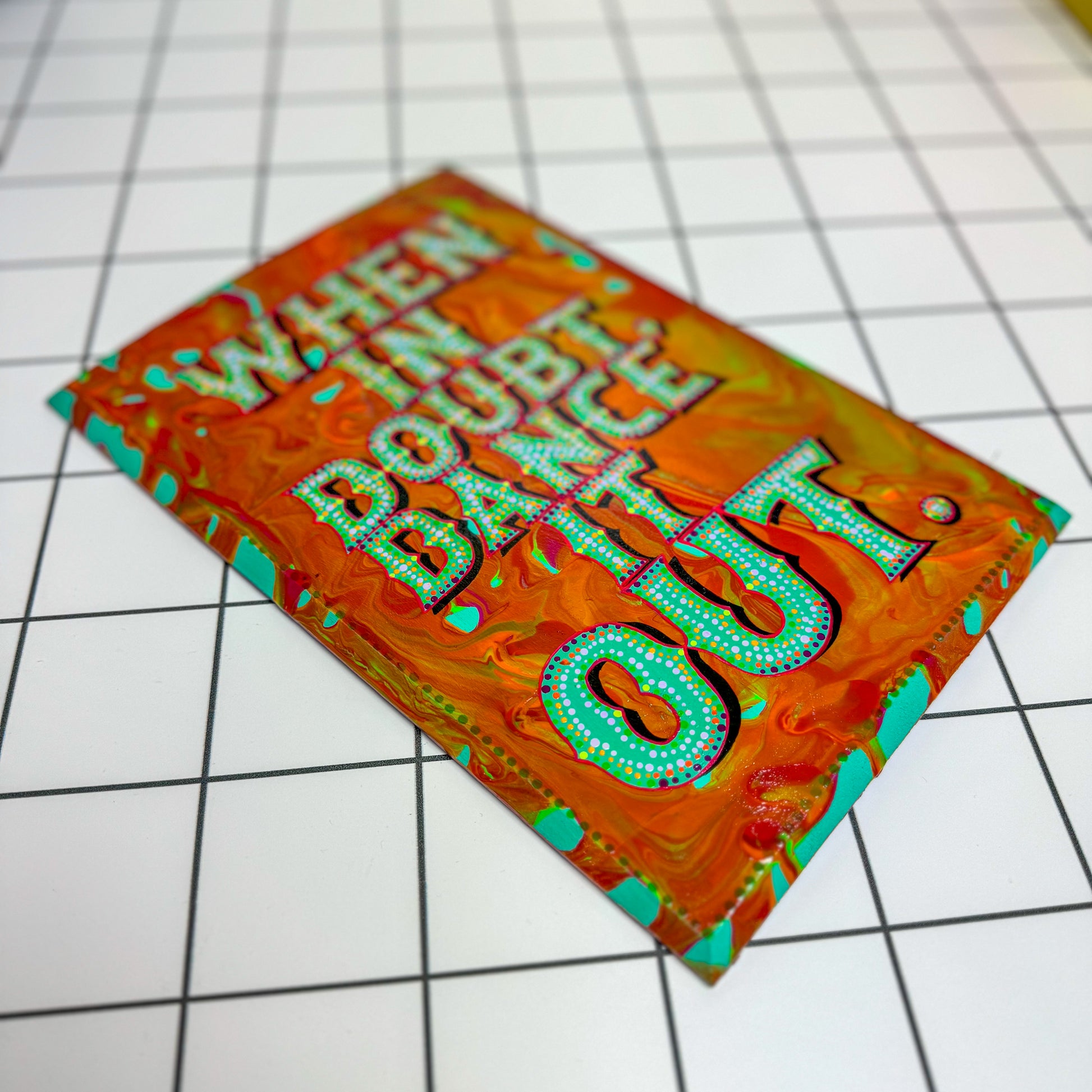Wooden sign hand-painted with “When In Doubt, Dance It Out!” in colourful, playful lettering by The Stoofy Store.