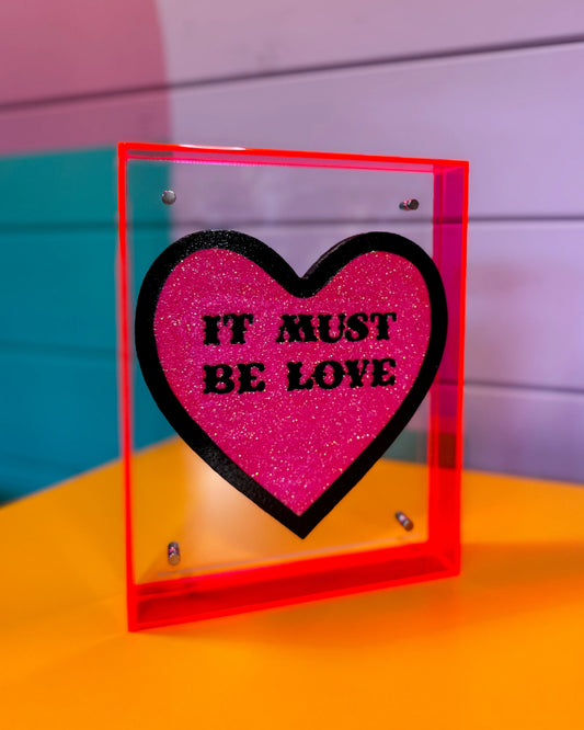 It Must Be Love artwork displayed on shelf in maximalist interior by Stoofy