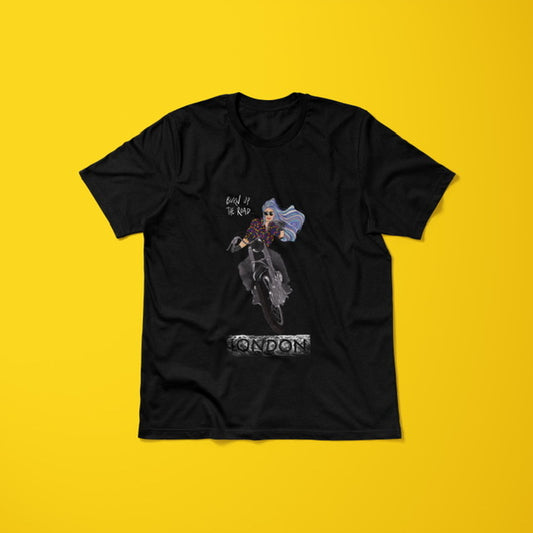 A black unisex t-shirt with a graphic illustration of a woman riding a motorbike and the text 'LONDON' displayed beneath the artwork. Design is on the back of the tshirt. Design artwork and copyright owned by Stoofy. Apparel perfect for bikers, motorbike motorcycle enthusiasts and lady bikers