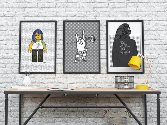 A mock up of Stoofy's It’s Only R&R Baby A3 Art Print, styled alongside Stoofy's "Yellow Lovely" A3 Art Prints and Stoofy's "First, We Ride... Then, We Whiskey" A3 Art Print. All designs are copyright of Stoofy, UK.